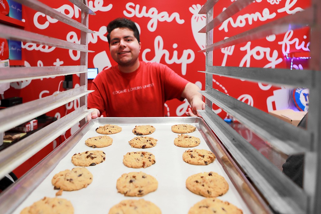 Mrs. Fields Franchise Staff Racking Cookies